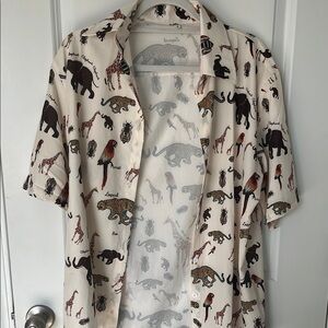 Woman’s cream animal print button down
